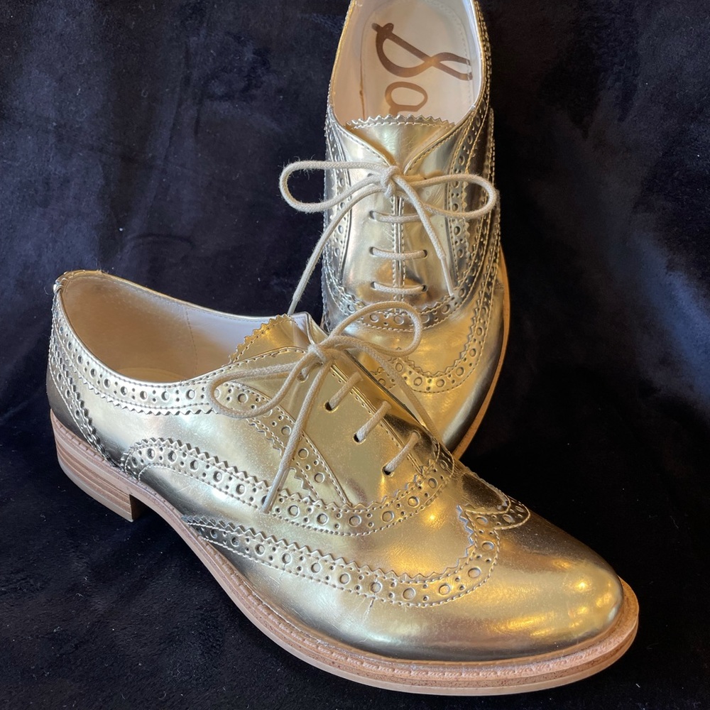 metallic silver. lace up